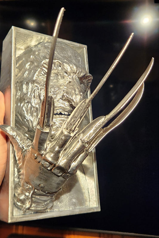 Chrome painted #D printed sculpture of Freddy Kruger